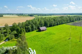 Lauksaimniecības zeme ar iesāktu māju