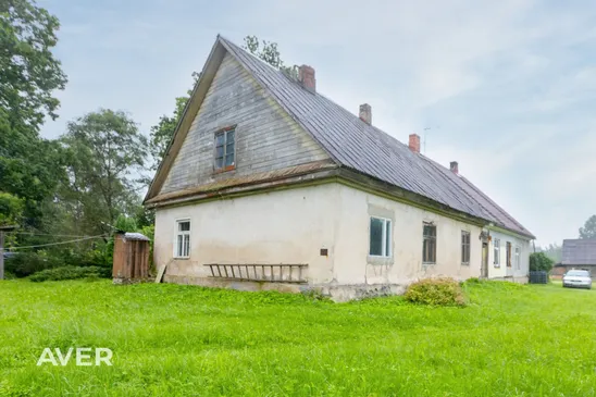 Pusmāja